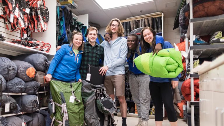 Ϲ students packing up gear in the Outdoor Pursuit office.