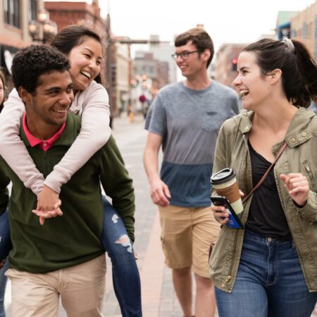 Ϲ students walking in downtown Duluth.